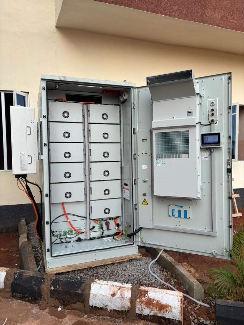 Technician servicing solar system